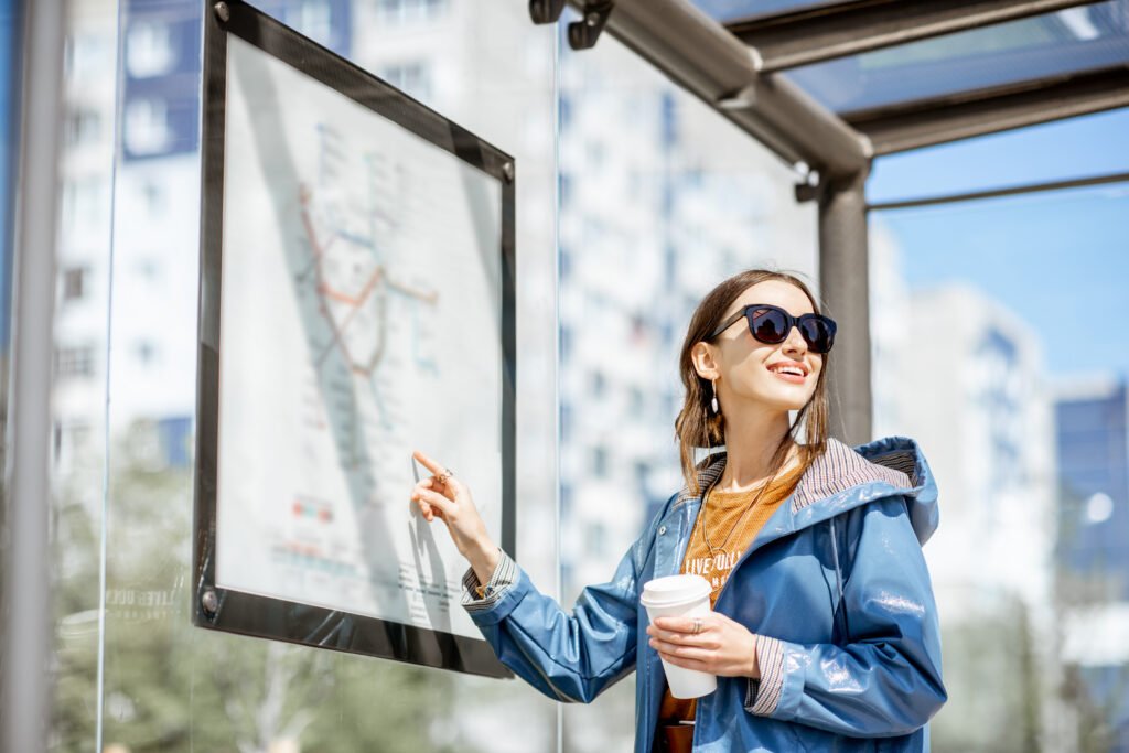 Woman at the tram station in the city